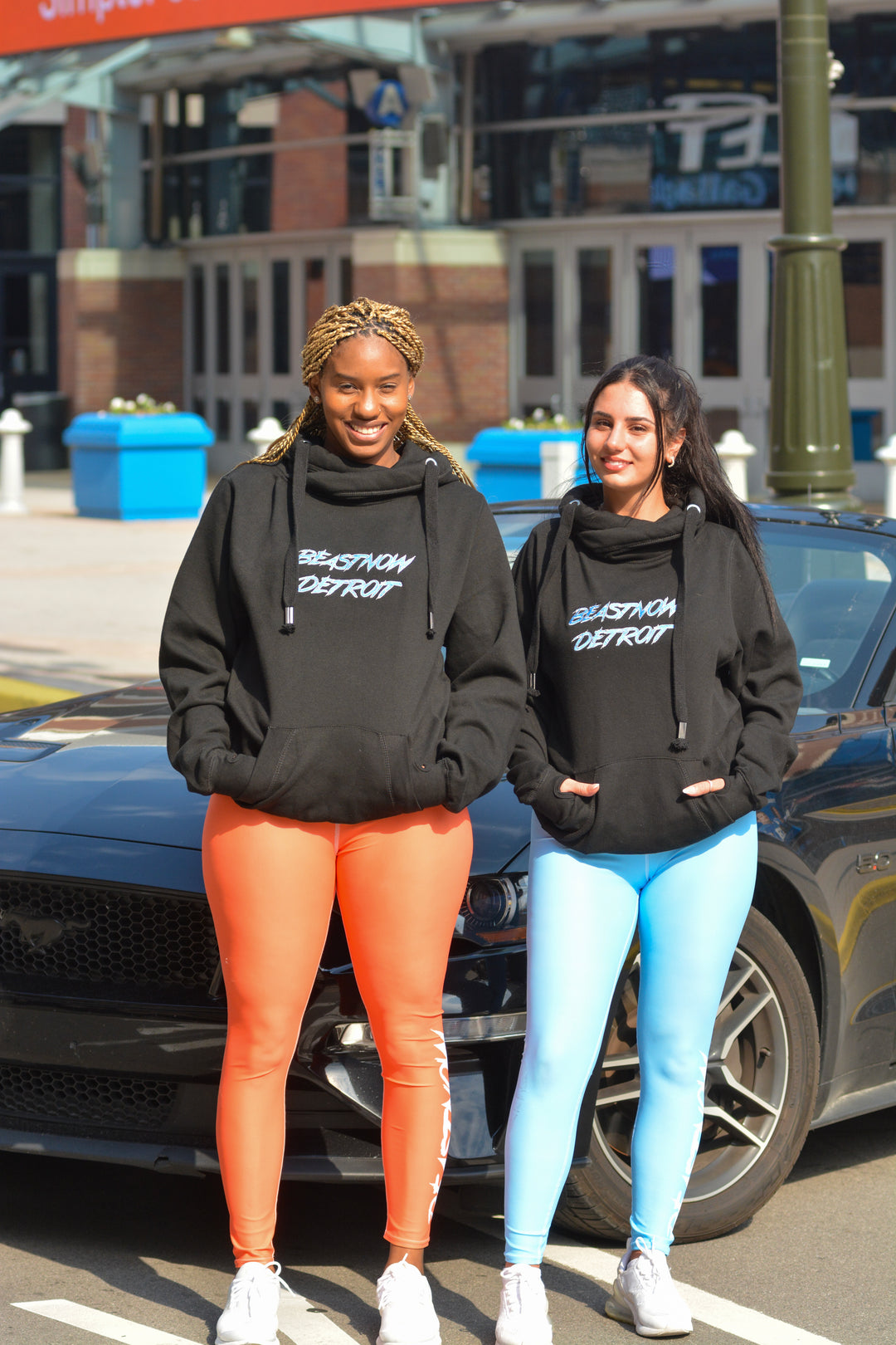 Model wearing the BeastNOW Detroit CrossNeck Hoodie in grey